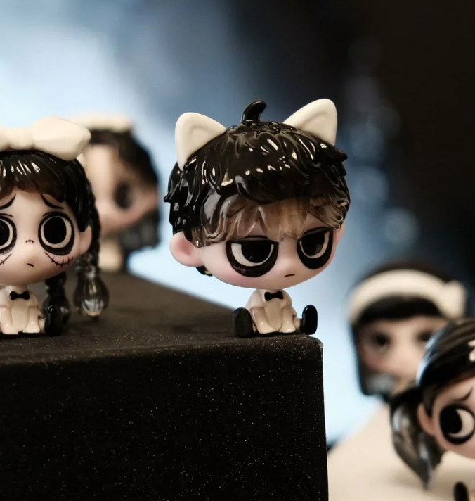 Kiki Sitting In A Row Bean toy doll