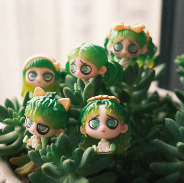 Kiki Sitting In A Row Bean toy doll