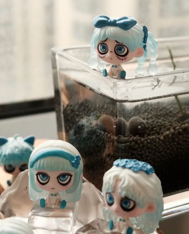 Kiki Sitting In A Row Bean toy doll