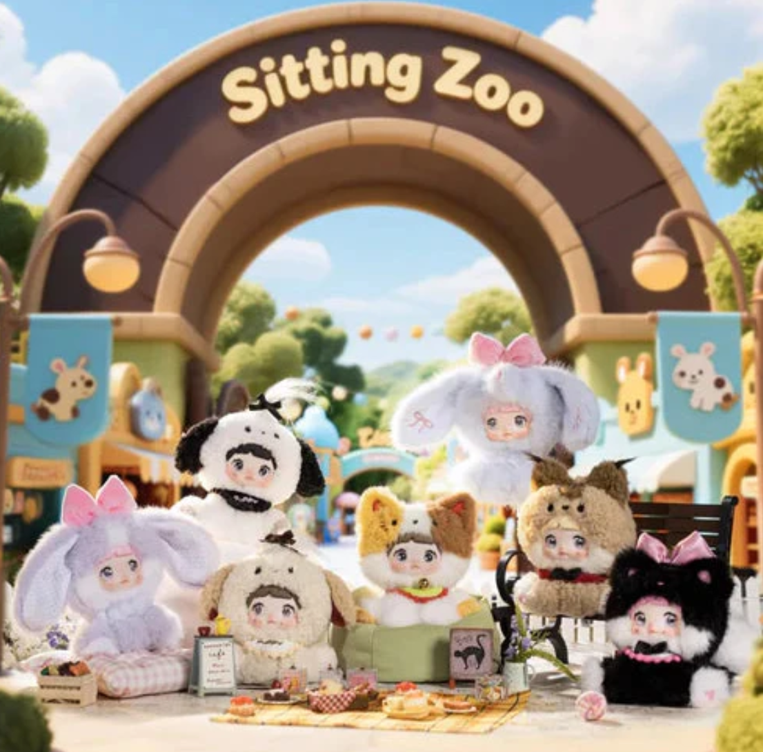 Nommi Sitting Zoo Plush toy doll